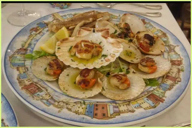 Comer marisco y prescado fresco en trattoria el Gatto Nero en Burano